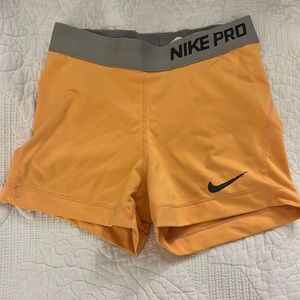 Women’s small orange Nike Pro spandex shorts